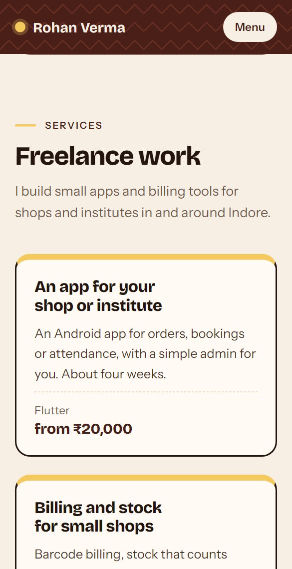 Rohan's freelance services in terracotta, with prices, on a phone